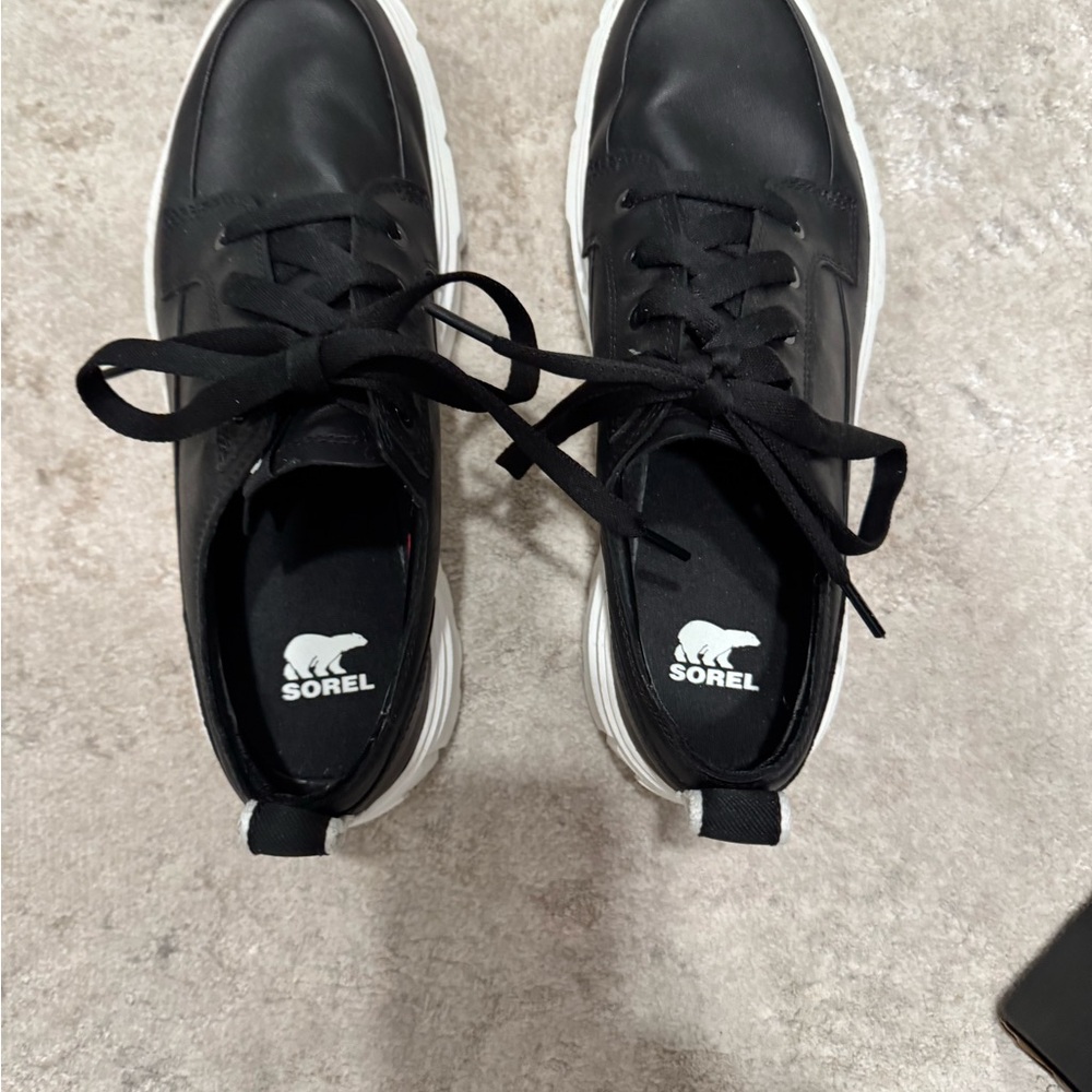 Sorel Women’s Black and White Sneakers waterproof